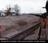 This is probably a Marengo Turn, setting out empty hoppers on the Union Pacific interchange track.&nbsp; The hoppers were used to haul coal loads from Wattis, Utah to the U&amp;I plant at Scalley, WA.&nbsp; This was an unusually large number of hoppers moving at once. 